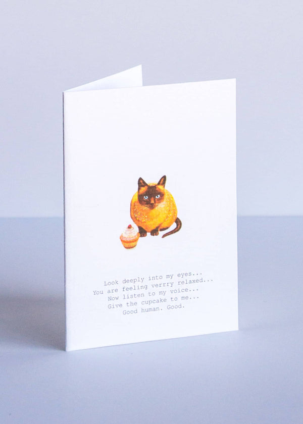 greeting card with vintage illustration of a Siamese cat with a cupcake